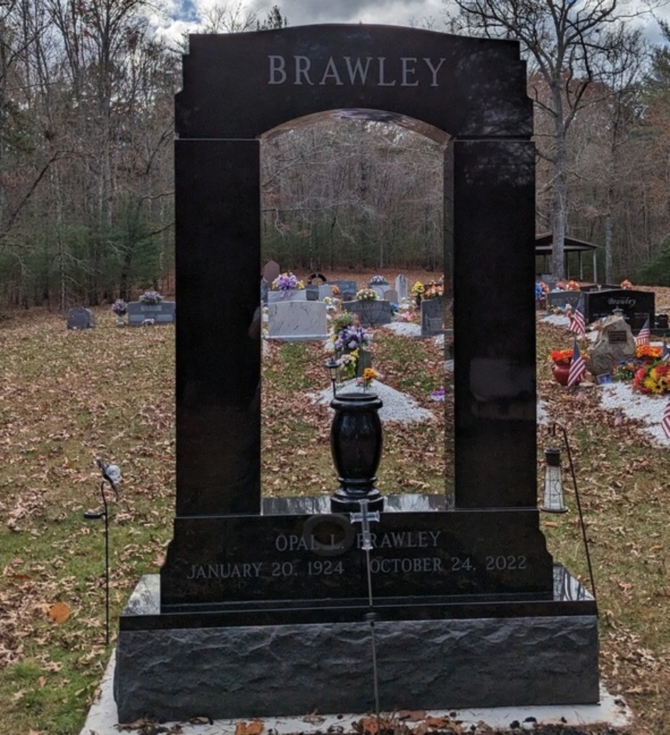 Granite headstone with flowers